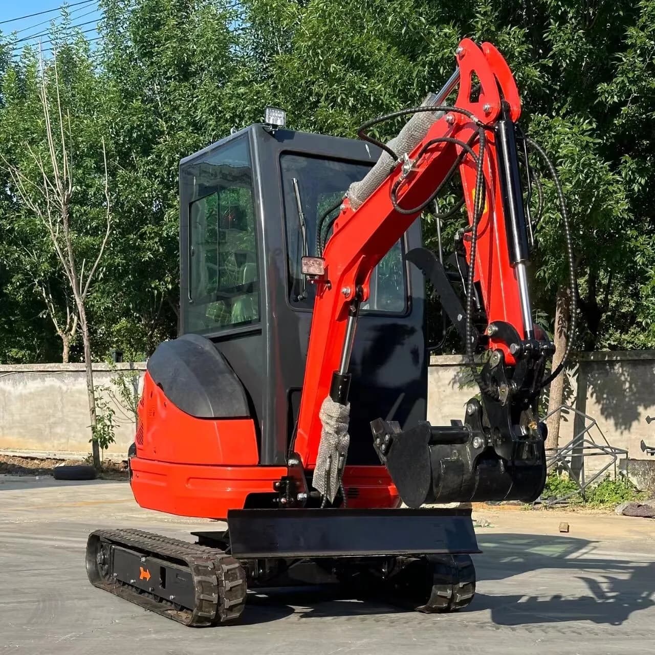 Red enclosed-cab excavator with bucket and tracks, front three-quarter view